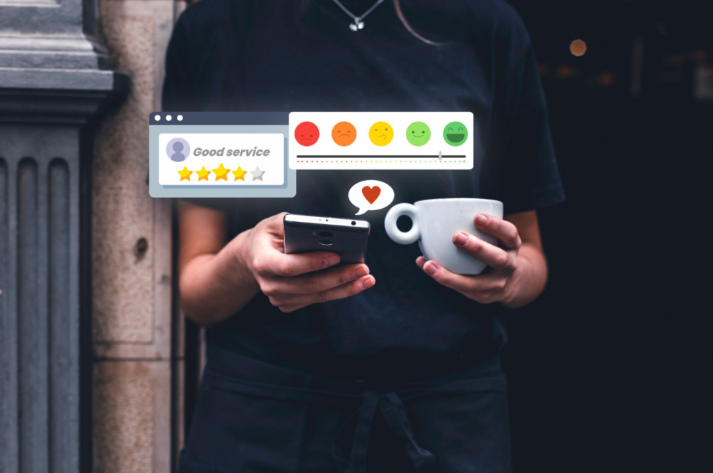 A person in a black t-shirt holding a smartphone and a coffee cup, with digital icons above showing a "Good service" rating and a range of satisfaction emojis.